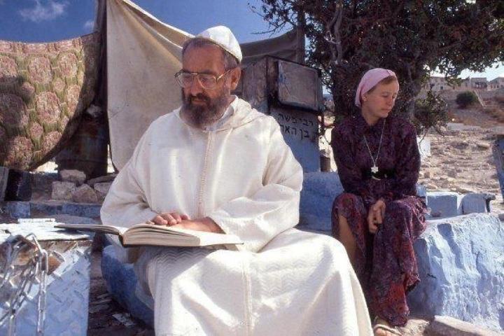 Rav Berg and Karen Berg studying the Zohar